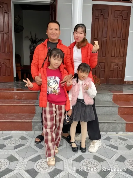 Family Practices Kung Fu in Coordinated Red Jackets – AI Generated Video | Hailuo AI