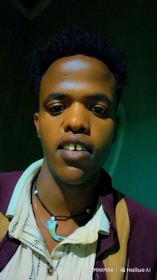 Kesnjee in Patterned Shirt with Distinctive Necklaces – AI Generated Video | Hailuo AI