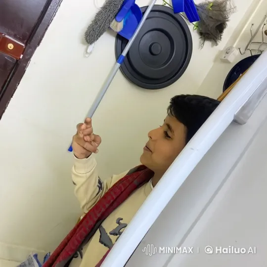 Person Mimics Smoking with Gestures in Static Room – AI Generated Video | Hailuo AI