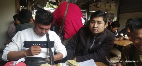 MAGBIX Logo: Man Prepares for Surprise Kungfu Move in Cafe – AI Generated Video | Hailuo AI
