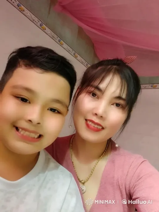 Young Boy Shows Mastery in Kungfu with Supportive Woman – AI Generated Video | Hailuo AI