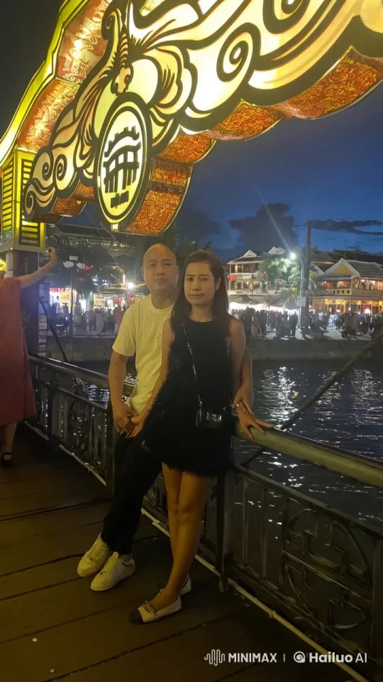 Couple Argues on Lantern-Lit Bridge at Night Market – AI Generated Video | Hailuo AI