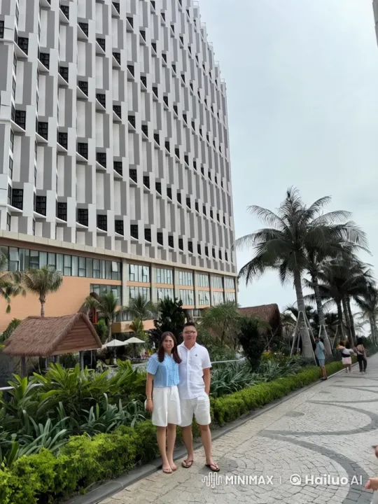 Couple Playfully Poses at Tropical Resort – AI Generated Video | Hailuo AI