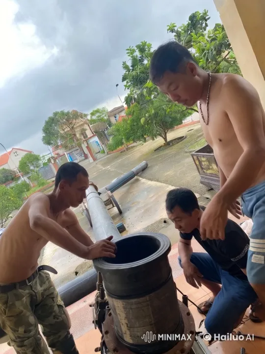Three Men Working on Large Pipe at Construction Site – AI Generated Video | Hailuo AI