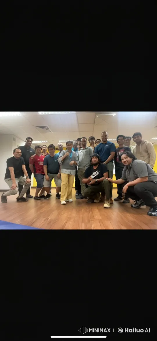 Group Engages in Playful Mock Fights in Indoor Setting – AI Generated Video | Hailuo AI