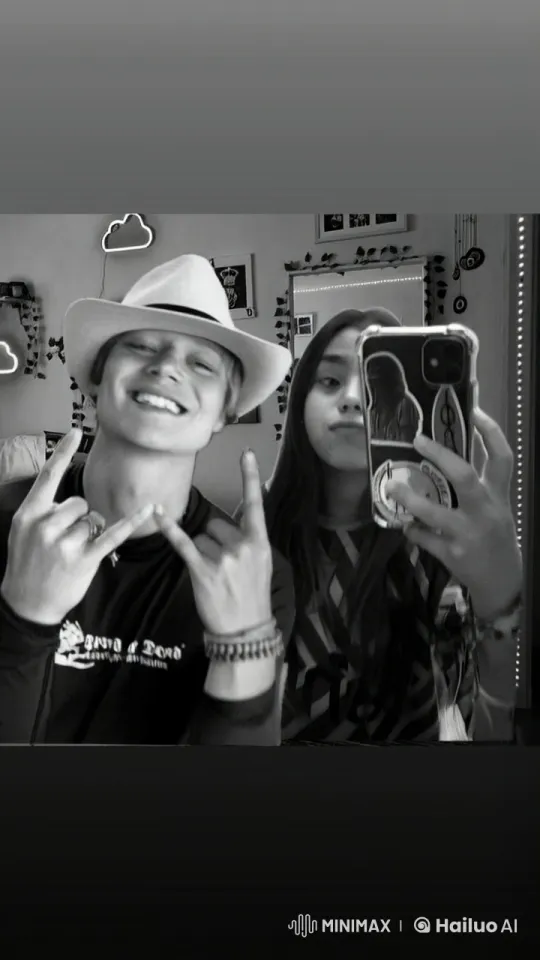 Couple Takes Intimate Selfie with Rock and Roll Flair – AI Generated Video | Hailuo AI