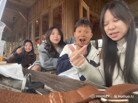 Friends Enjoying a Lighthearted Kungfu Battle at a Café – AI Generated Video | Hailuo AI