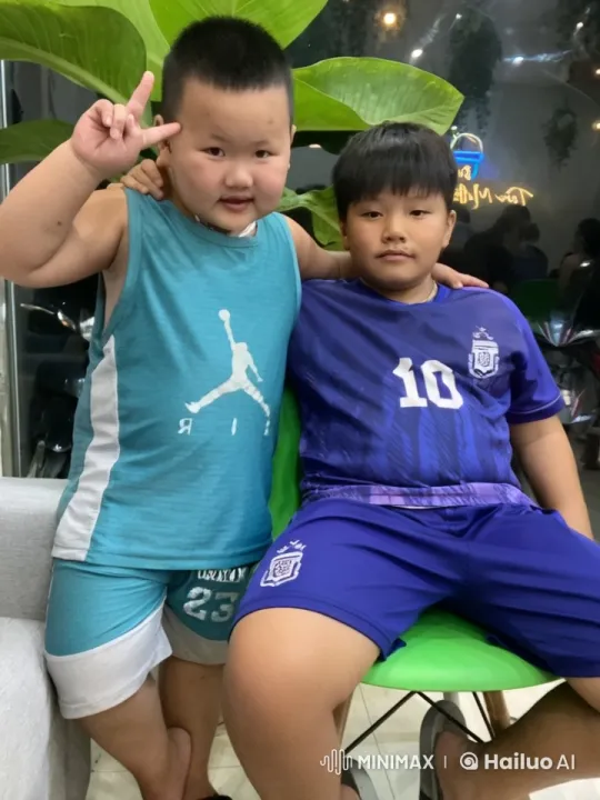 Boys Playfully Practice Kungfu in Cozy Room – AI Generated Video | Hailuo AI