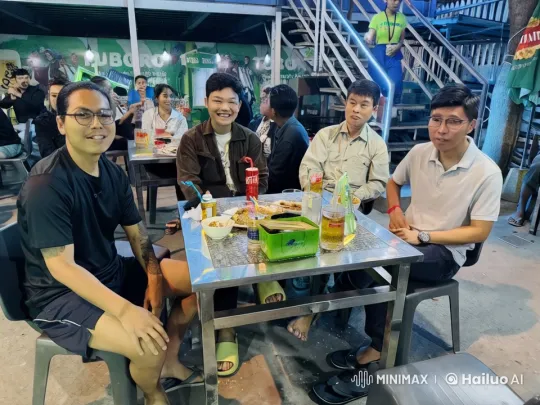 Friends Enjoying a Playful Kung-Fu Fight at an Outdoor Restaurant – AI Generated Video | Hailuo AI