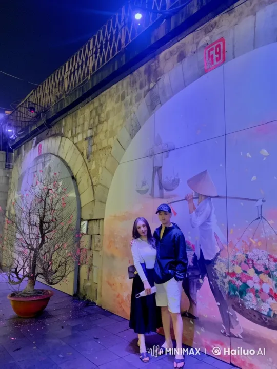 Couple Performs Dynamic Kung Fu Under Street Art Arch – AI Generated Video | Hailuo AI