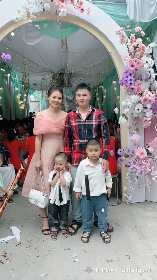 Family Celebrates with Martial Arts Display Under Floral Arch – AI Generated Video | Hailuo AI