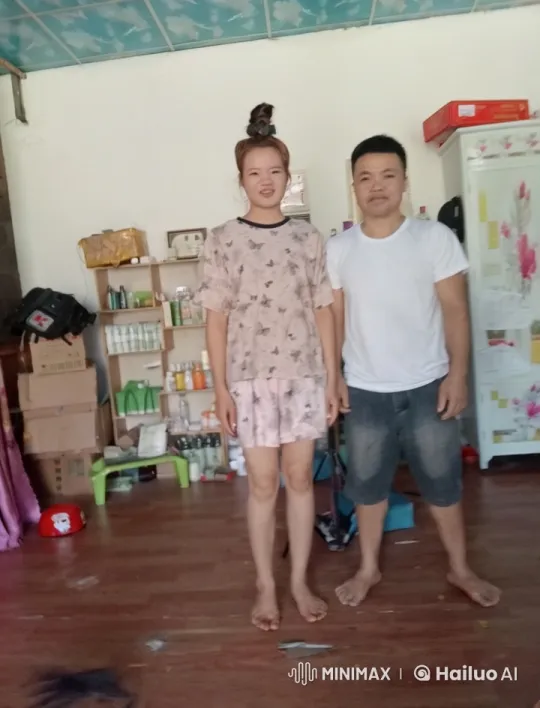 Couple Standing in Lived-in Room with Casual Attire – AI Generated Video | Hailuo AI