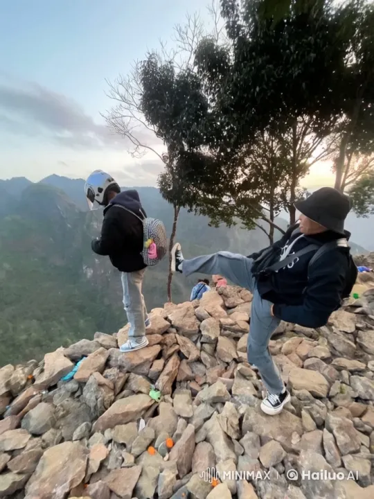 Mountain Sunset: Two Friends Enjoying the Scenery – AI Generated Video | Hailuo AI