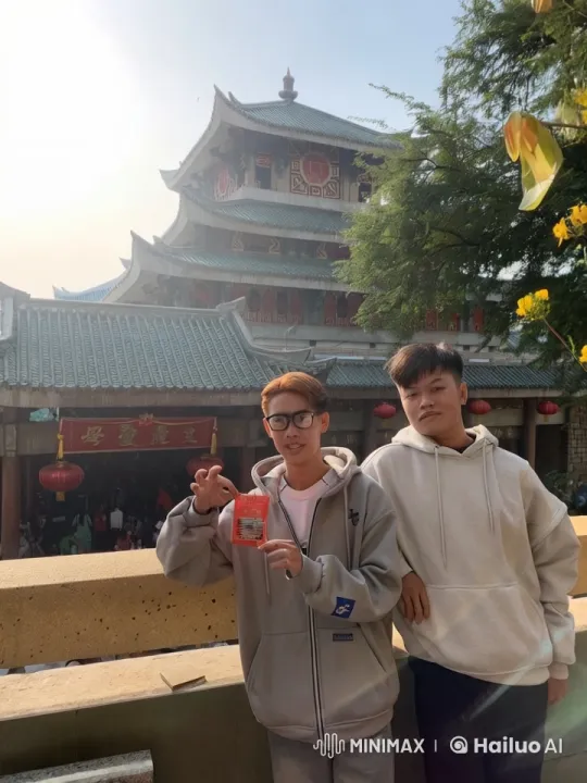 Young Men Demonstrate Kungfu in Front of Chinese Temple – AI Generated Video | Hailuo AI