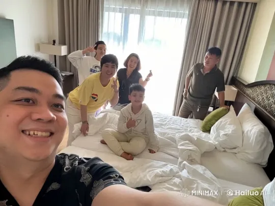Friends Playfully Mock-Fighting on a Sunlit Hotel Bed – AI Generated Video | Hailuo AI