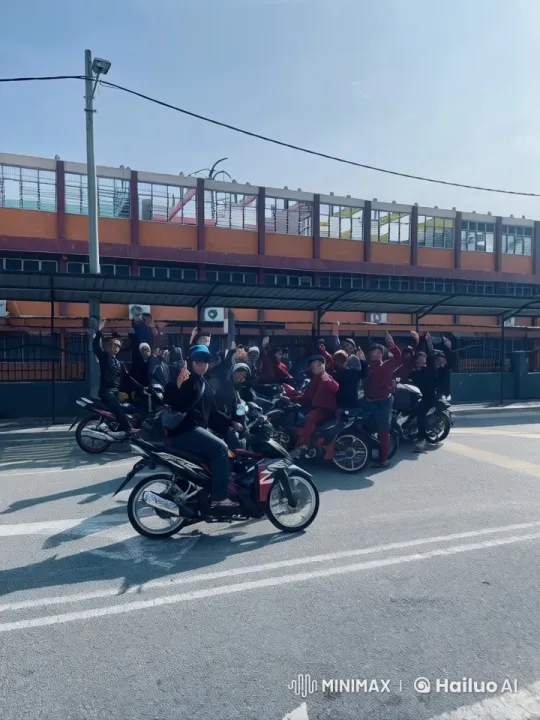 Motorbike Kungfu Display in Front of Orange Building – AI Generated Video | Hailuo AI