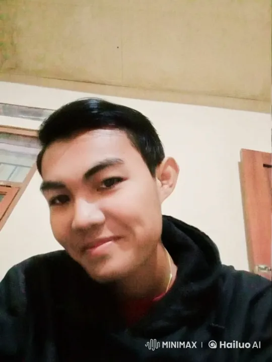 Quiet Indoor Scene with Hooded Person – AI Generated Video | Hailuo AI