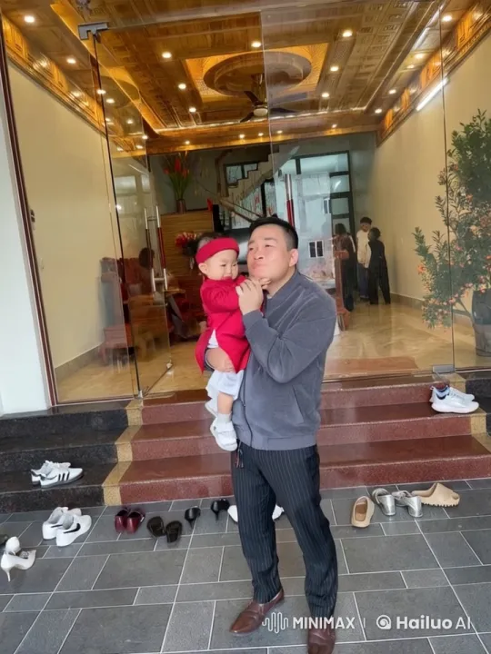 Man and Child Playfully Spar at Festive House Entrance – AI Generated Video | Hailuo AI