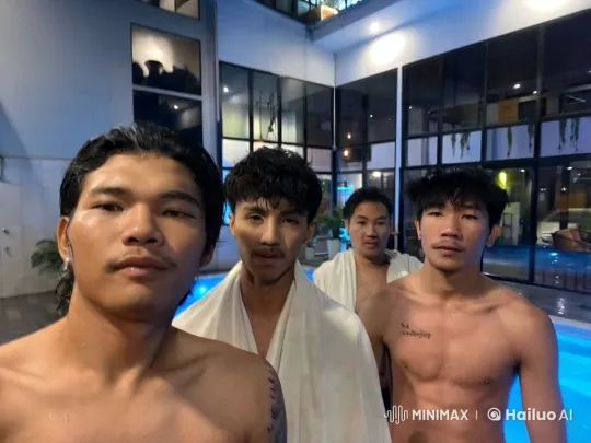 Four Men Perform Synchronized Airborne Boxing in Modern Pool Setting – AI Generated Video | Hailuo AI