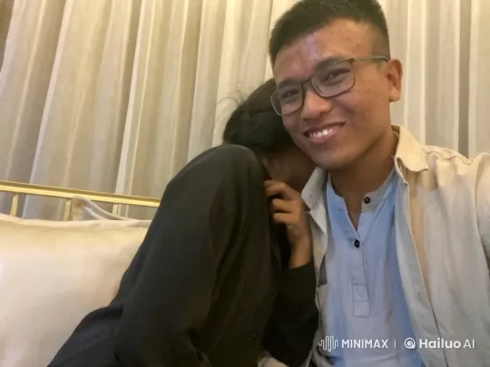 Affectionate Pair Resting Together in Cozy Room – AI Generated Video | Hailuo AI