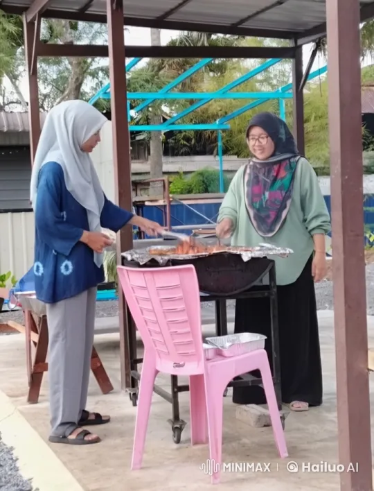 Two Women in Hijabs Playfully Spar Near a Barbecue – AI Generated Video | Hailuo AI