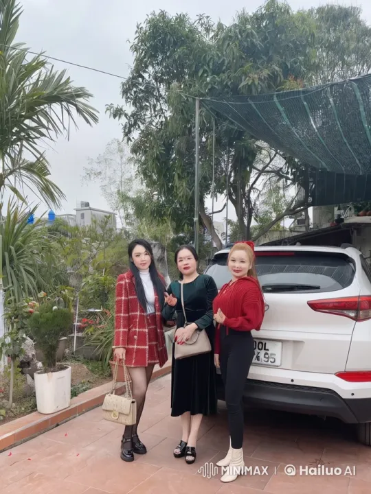 Three Women Pose for Photo in Garden Setting – AI Generated Video | Hailuo AI