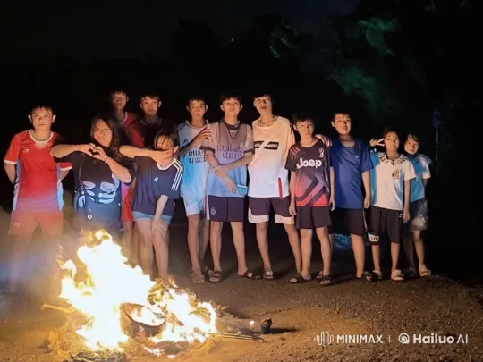 Young Martial Artists Practicing by Firelight – AI Generated Video | Hailuo AI