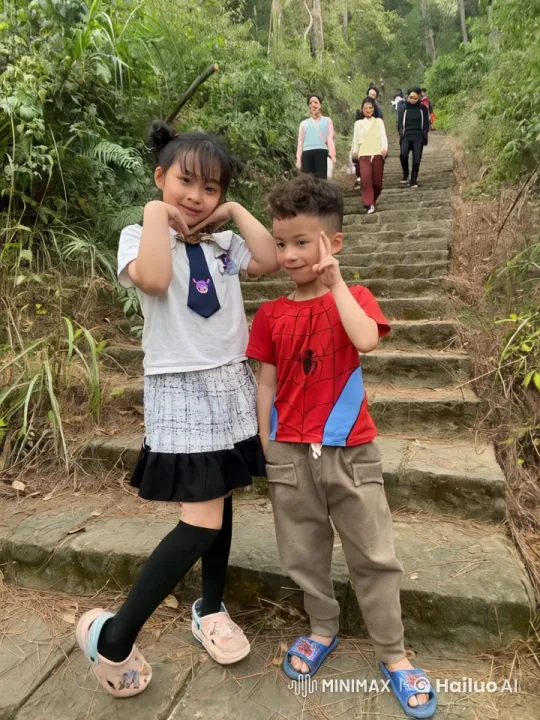Children Playfully Mimic Kung Fu in Forest Setting – AI Generated Video | Hailuo AI