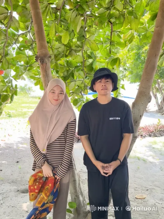 Couple Displaying Martial Arts Skills Under a Tree – AI Generated Video | Hailuo AI