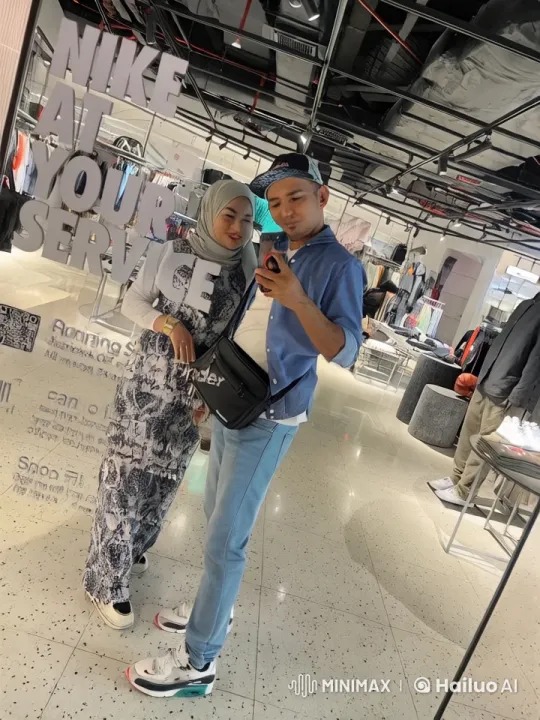 Couple Engages in Playful Martial Arts Sparring in Retail Store – AI Generated Video | Hailuo AI