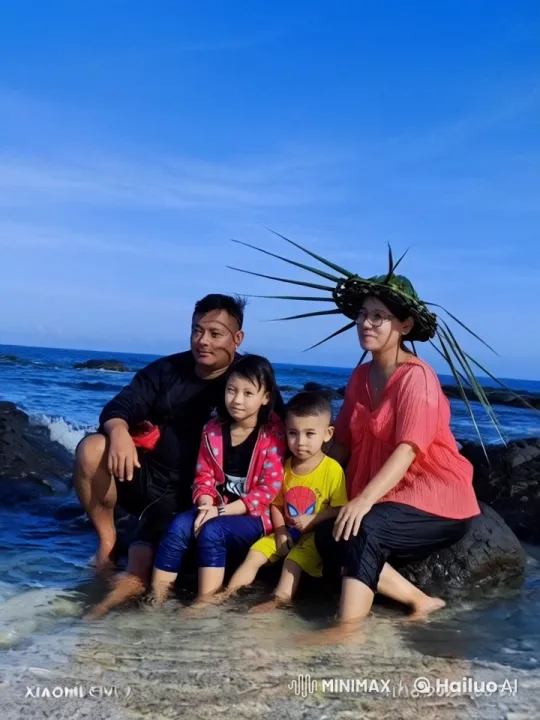 Family Enjoying a Serene Moment by the Sea – AI Generated Video | Hailuo AI