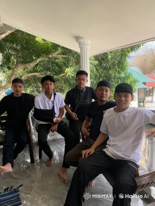 Martial Arts Display by Young Men on a Shaded Porch – AI Generated Video | Hailuo AI