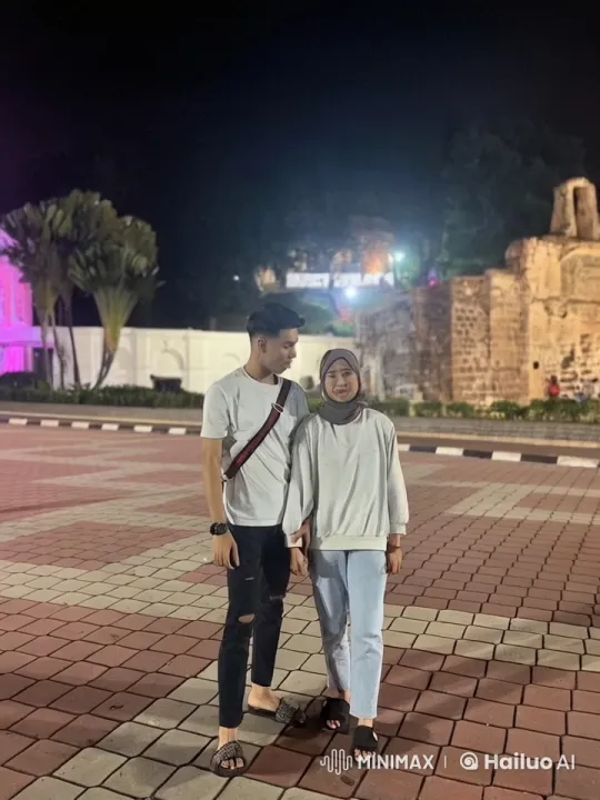 Couple Demonstrates Energetic Kungfu Skills in Historic Square – AI Generated Video | Hailuo AI