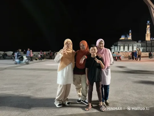 Traditional Attire Performers Show Kungfu in Front of Illuminated Mosque – AI Generated Video | Hailuo AI