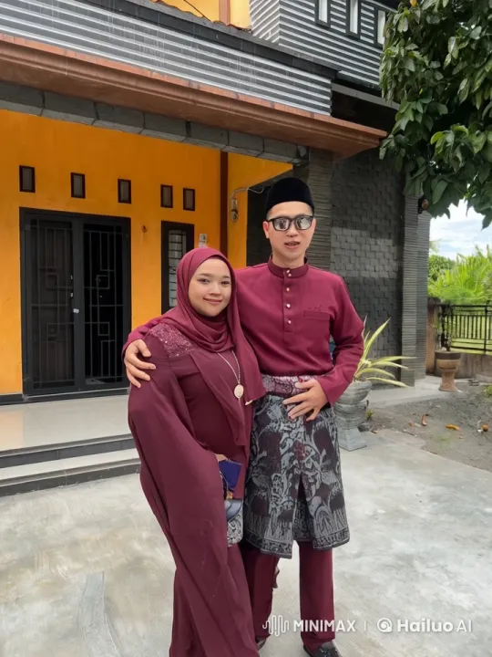 Couple Demonstrates Martial Arts Skills in Front of Colorful House – AI Generated Video | Hailuo AI