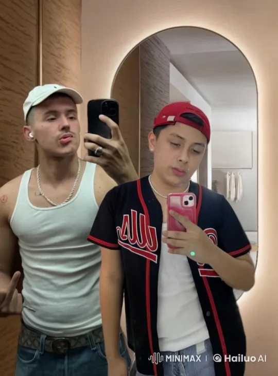 Young Men Share Affectionate Moment in Mirror – AI Generated Video | Hailuo AI