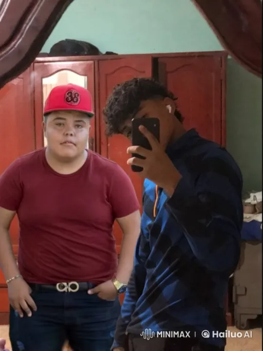 Young Friends Embrace in Cozy Bedroom Setting – AI Generated Video | Hailuo AI