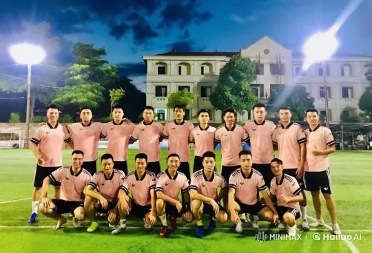 Soccer Players in Pink Display Martial Arts Skills on Night Field – AI Generated Video | Hailuo AI