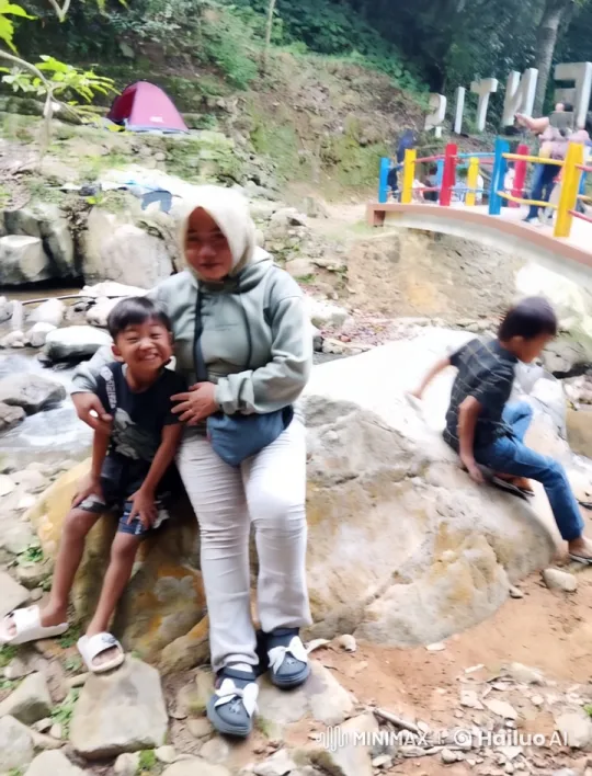 Family Enjoying Playful Kungfu Poses by Stream – AI Generated Video | Hailuo AI