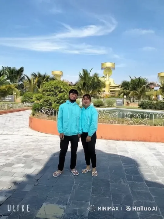 Couple Performs Dynamic Kung Fu in Futuristic Garden Setting – AI Generated Video | Hailuo AI