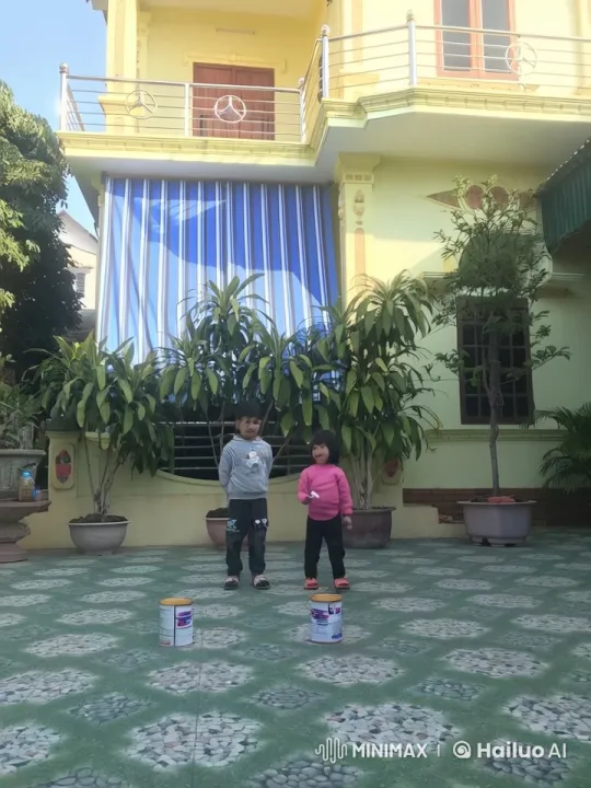 Children Play Fight in Front of Yellow House – AI Generated Video | Hailuo AI