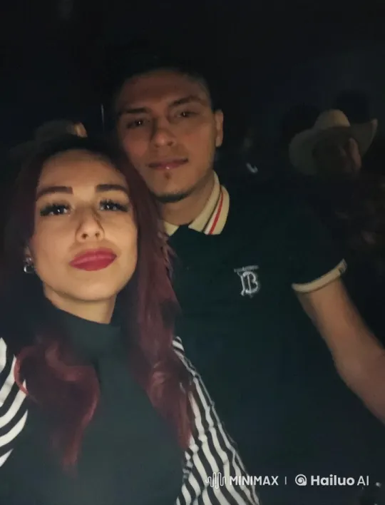 Intimate Couple's Kiss in Cozy, Dimly Lit Venue – AI Generated Video | Hailuo AI