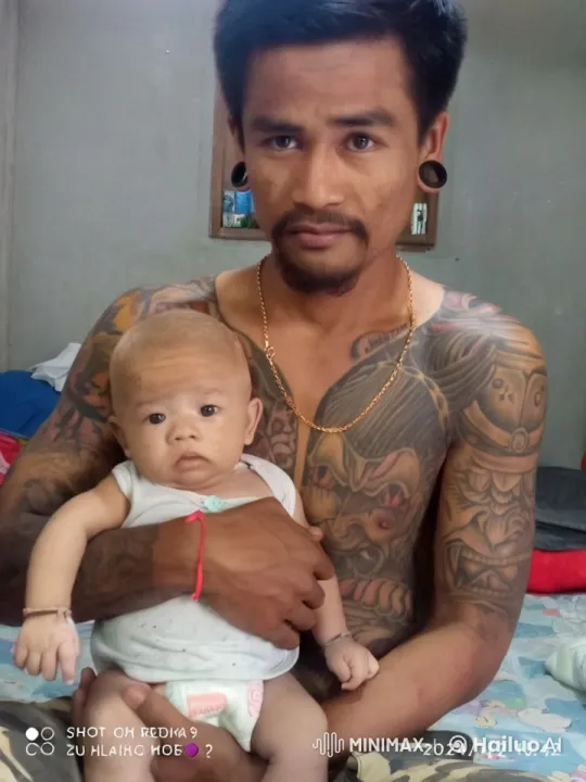 Tattooed Man Practices Kung Fu With Baby – AI Generated Video | Hailuo AI