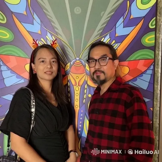 Affectionate Kiss Framed by Butterfly Art – AI Generated Video | Hailuo AI