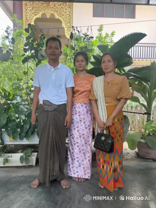Traditional Attire Displayed by Trio in Lush Setting – AI Generated Video | Hailuo AI