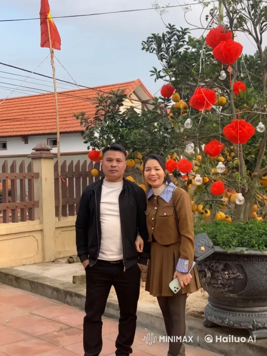 Vietnamese Kung Fu Duo Showcases Agility in Festive Courtyard – AI Generated Video | Hailuo AI