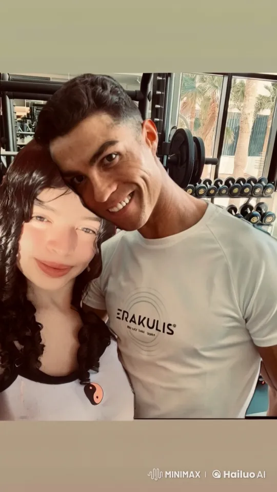 Couple Shares Tender Moment in Organized Gym Setting – AI Generated Video | Hailuo AI