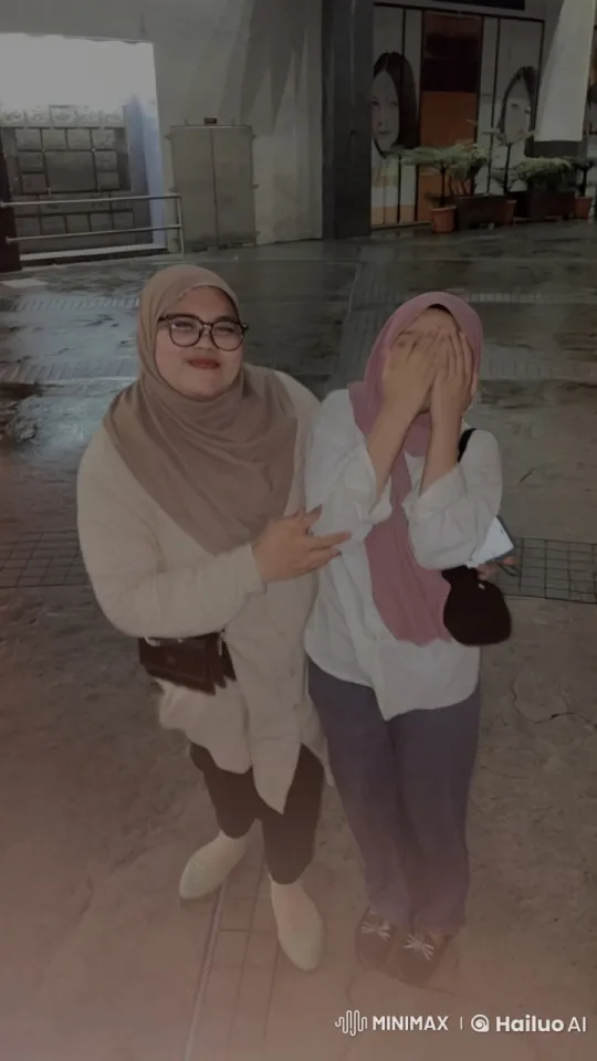 Two Women Under Shelter on Rainy Evening – AI Generated Video | Hailuo AI