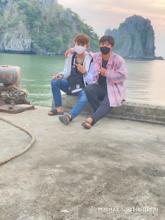 Friends Engage in a Kungfu Fight by a Scenic Dock – AI Generated Video | Hailuo AI