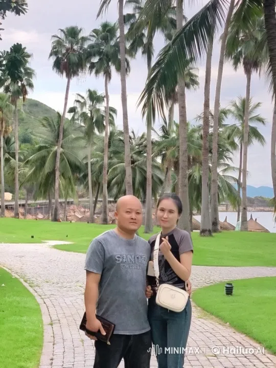 Couple Engages in Playful Kung Fu Sparring on Scenic Path – AI Generated Video | Hailuo AI